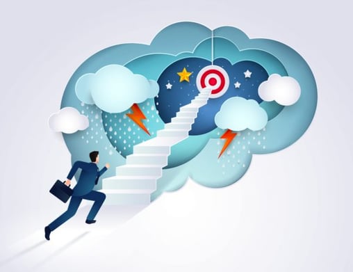 Businessman running up stairway to the target